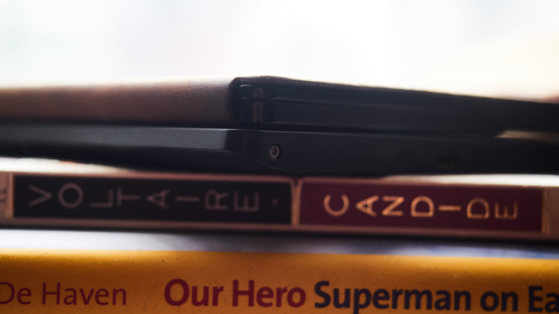The leather case of the Oasis (top) versus the Aura H2O (bottom).